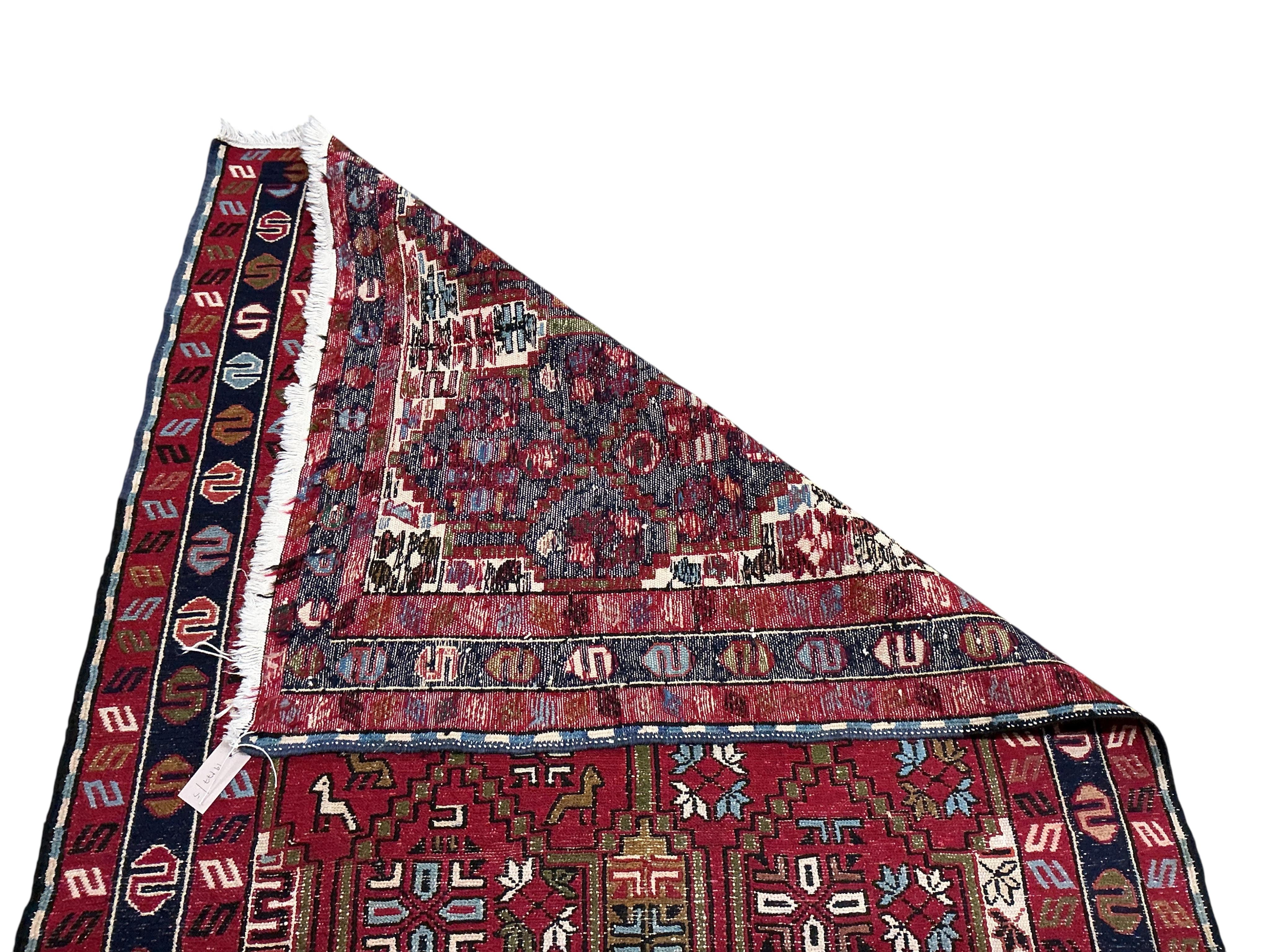 A Soumak geometric rug, 200 x 115cm